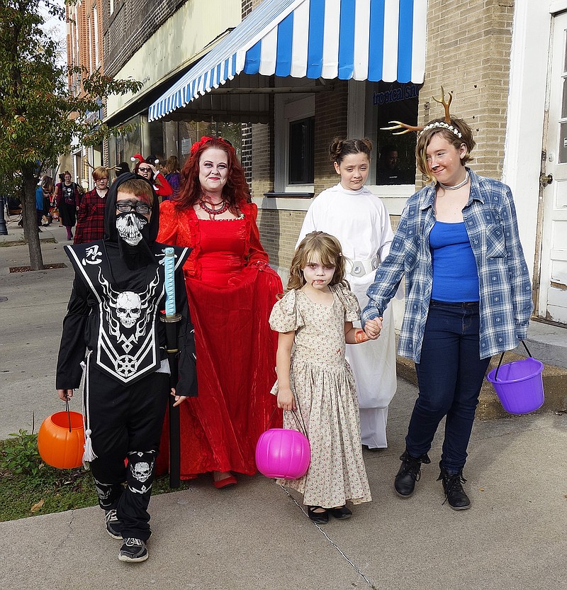 Skeleton/ninja Cameron Barnahart, accompanied by Summer Hendricks, Isadora Sorrels, Lilli Woprley and Kaylee King, came to downtown Fulton last Halloween as a mixture of characters. Tonight's Brick District festivities start at 4 p.m.