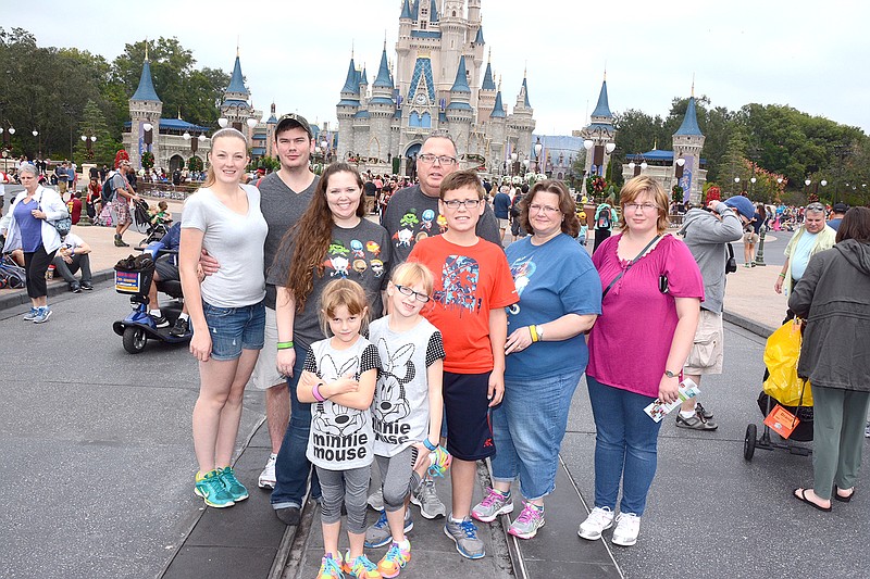 The Figgins family has grown through foster care and adoption. Pictured, in back, are Anastasia Hansen, Don Figgins, Casey Figgins, Bill Figgins, Cathy Figgins and Katie Figgins. In the front are Amber Figgins, Brooklynn Figgins and Skip Figgins.