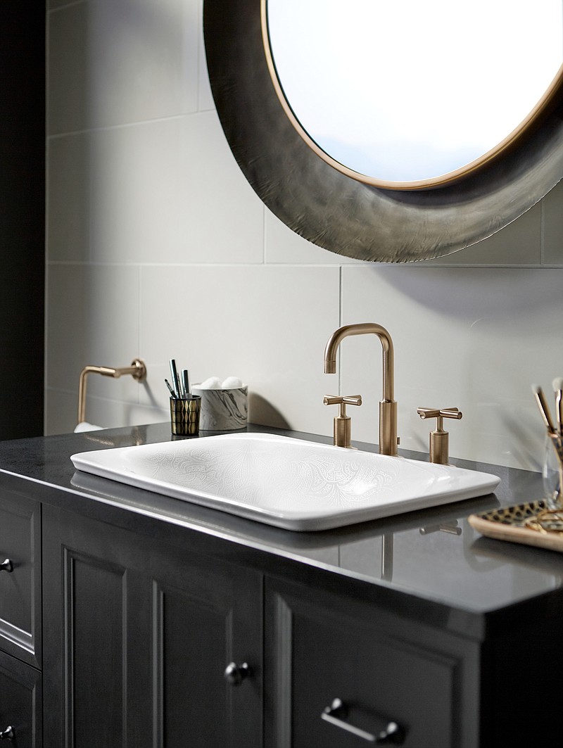 A widespread faucet is a great choice for larger vanities and pedestal bathroom sinks. (Kohler)