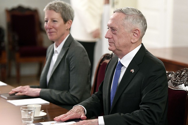 US Secretary of Defense James Mattis, right, meets with President of Finland Sauli Niinisto in Helsinki, Finland, Monday Nov. 6, 2017. Heading into a week of meetings with Nordic countries and allies across Europe, Mattis must begin to articulate what has been a murky American policy on how the future of Syria unfolds. (Heikki Saukkomaa/Lehtikuva via AP)