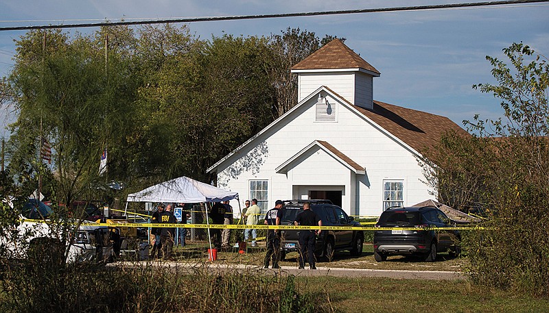 A man dressed in black tactical-style gear and armed with an assault rifle opened fire inside the church.
