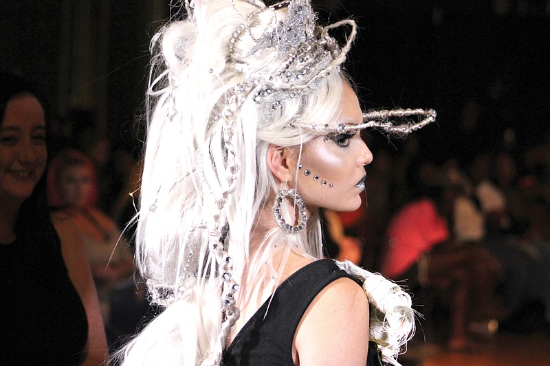 Michelle Willis models the "Northern Lightning" look Monday during Texarkana College's annual Shear Madness Avant Garde Hair and Fashion Show. The futuristic look won second place in the adult category of the competition.