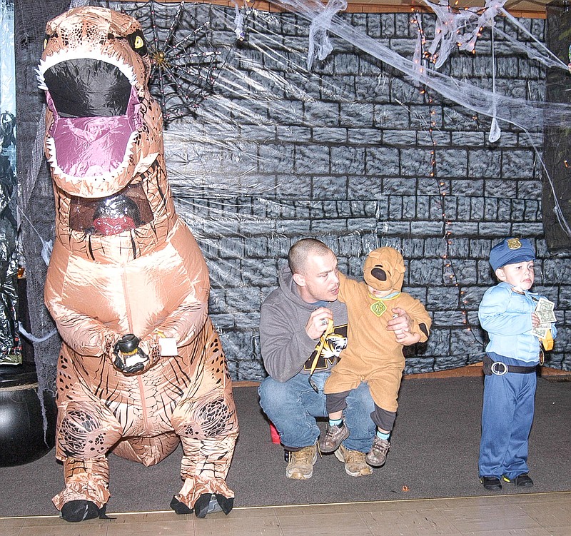 In the Funniest category at the Eagles Club Halloween event were: first place - Zane Gillmore as Dinosaur, second - Jackson Purnell as Scoobie-Doo, and third - Ryker Fleming as Policeman.