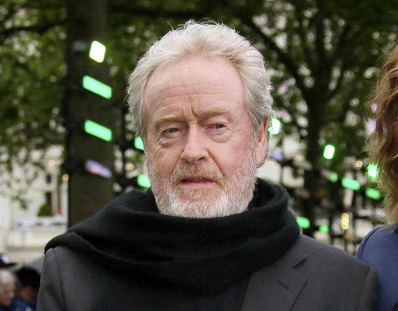 FILE - In this May 4, 2017 file photo, director Ridley Scott appears at the premiere of the film "Alien: Covenant" in London. Scott   decided to replace Kevin Spacey in the role of oil tycoon J. Paul Getty in his upcoming, already completed film “All the Money in the World.” He plans to reshoot the actor’s many scenes with Christopher Plummer and make a release date that’s just six weeks away. (Photo by Joel Ryan/Invision/AP, File)
