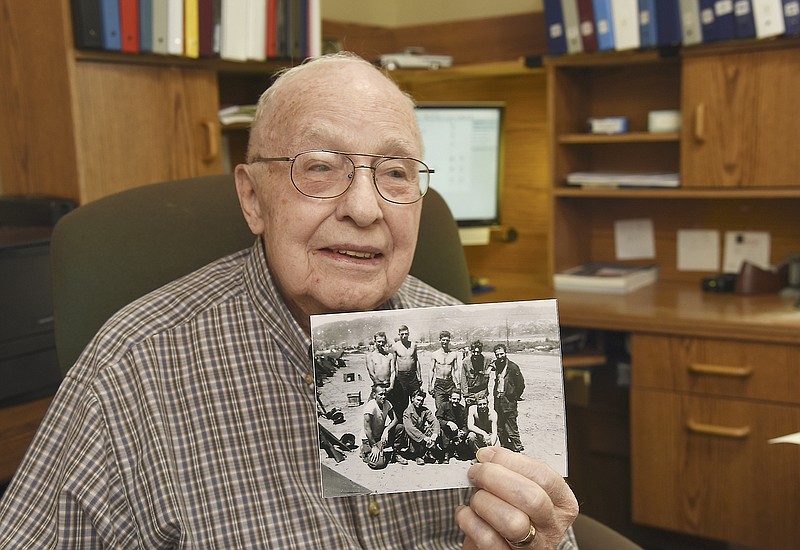 Bernard Schanzmeyer points himself out in a photograph taken in 1951 as he talks about his time in Korea during his stint in the U.S. Army.