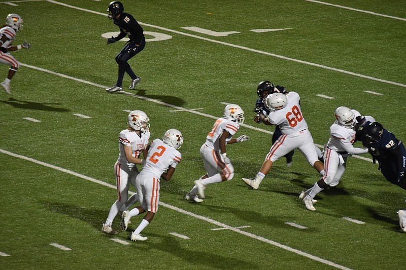 Texas High's Traceki Cooper takes a handoff against Pine Tree on Friday night in Longview, Texas. (Submitted photo by Kevin Sutton)
