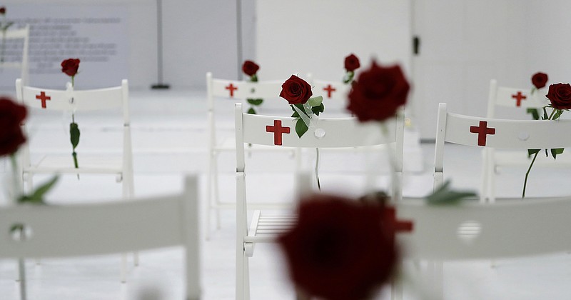 <p>AP</p><p>A memorial for the victims of the shooting at Sutherland Springs First Baptist Church, including 26 white chairs each painted with a cross and and rose, is displayed in the church Sunday in Sutherland Springs, Texas. A man opened fire inside the church in the small South Texas community last week, killing more than two dozen.</p>