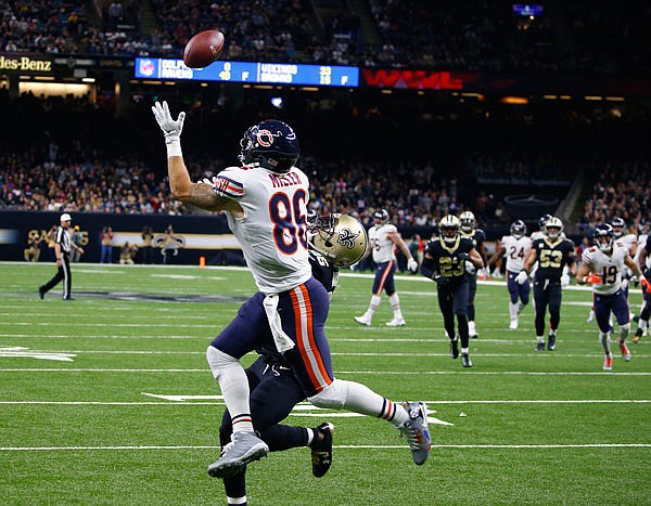 Bears tight end Zach Miller pulls in a touchdown reception, which was ruled incomplete upon review, as Saints defensive back Rafael Bush defends, in the second half of a game last month in New Orleans.