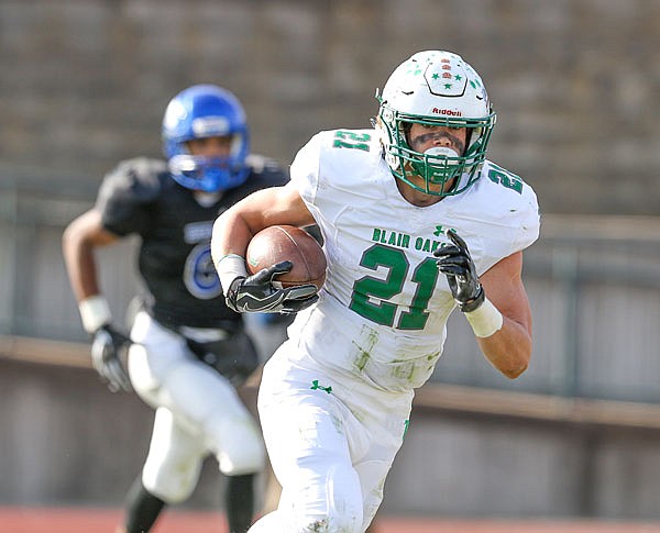 Braydan Pritchett of Blair Oaks runs in the open fileld during Saturday afternoon's Class 3 quarterfinal game against the McCluer South-Berkeley in Ferguson.