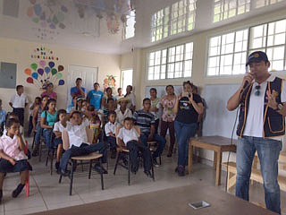 A member of the Panama City Rotary Club speaks to students and residents about why having clean water is important and about how to protect containers so water doesn't get contaminated. This was during the third trip members of Mid-Missouri Rotary clubs have taken as part of a project to bring water purification systems to communities in Panama.