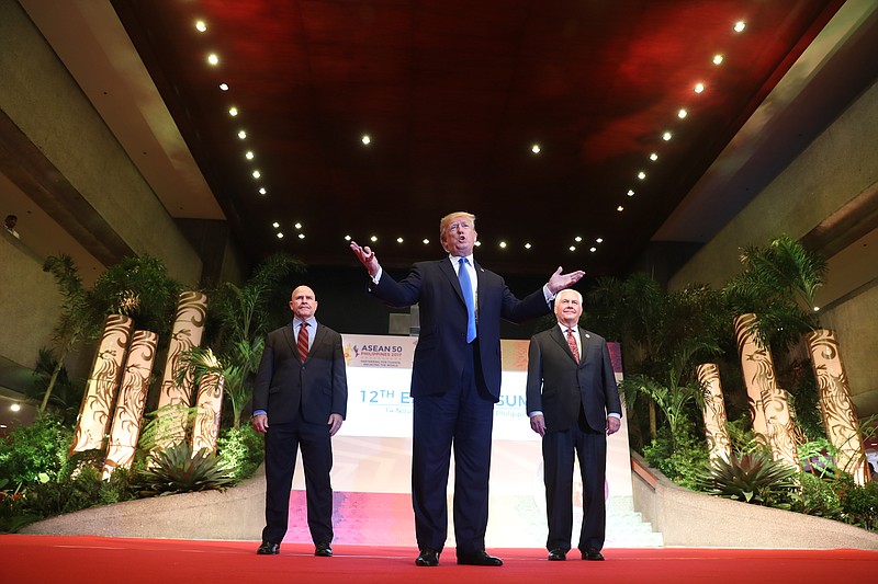 President Donald Trump, center,  gives a statement before leaving for the airport, an East Asia Summit at the Philippine International Convention Center, Tuesday, Nov. 14, 2017, in Manila, Philippines. Secretary of State Rex Tillerson is seen at right while National Security Adviser H.R. McMaster is at left. Trump is on a five country trip through Asia traveling to Japan, South Korea, China, Vietnam and the Philippines. (AP Photo/Andrew Harnik)