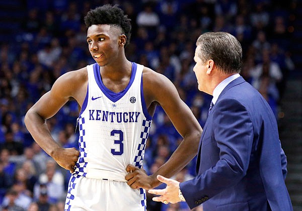 Kentucky's Hamidou Diallo receives instructions from head coach John Calipari during the second half of Sunday's game against Vermont in Lexington, Ky.