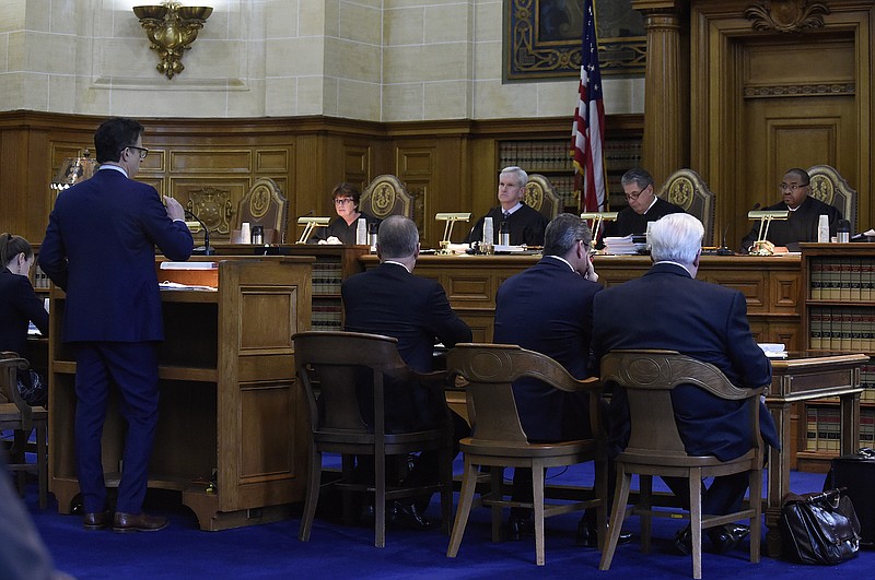 The Connecticut Supreme Court listens to attorney Josh Koskoff on arguments on whether gun maker Remington Arms should be held liable for the 2012 Newtown school massacre, in Hartford, Conn., Tuesday, Nov. 14, 2017. A survivor and relatives of nine people killed in the shooting are trying to sue the North Carolina company that made the AR-15-style rifle used to kill 20 first-graders and six educators at Sandy Hook Elementary School. A lower court dismissed the lawsuit.
