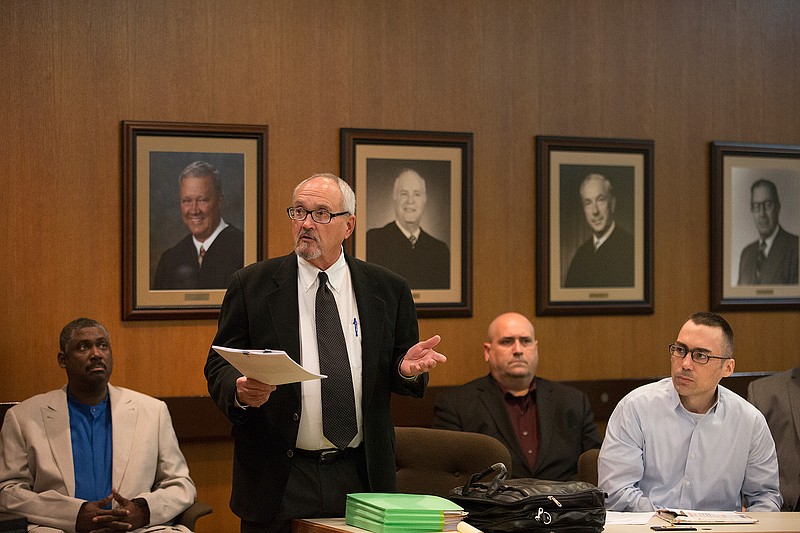 Billy Joel Tracy's lead defense attorney, Mac Cobb of Mount Pleasant, stands as he discusses issues related to witnesses expected to testify for the defense at a hearing Nov. 8 before 102nd District Judge Bobby Lockhart. Tracy, in glasses, is seated at the defense table with Texas Department of Criminal Justice staff nearby. Tracy is facing a possible death sentence in the July 2015 fatal beating of Correctional Officer Timothy Davison at the Barry Telford Unit in New Boston, Texas.