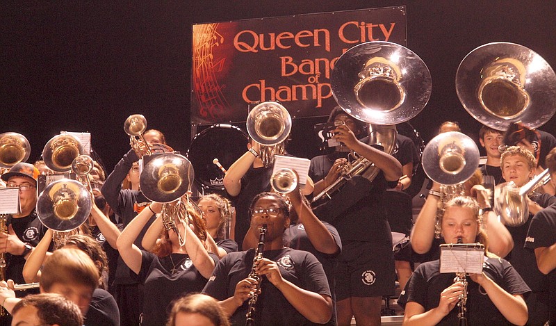 The Queen City High Band performs high in the football stands. The band placed fourth in the best-in-state marching competition.