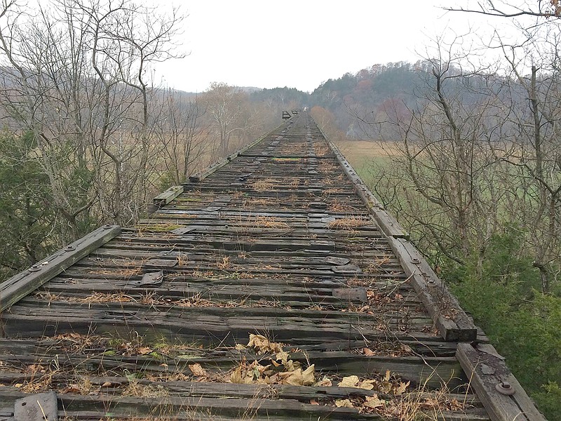 A photo taken Wednesday, Nov. 15, 2017, by salvage company A&K Railroad Materials Inc. personnel shows the Gasconade River bridge where officials are investigating an overnight fire. The bridge is part of the Rock Island railroad line proposed to be converted to the Rock Island Trail.