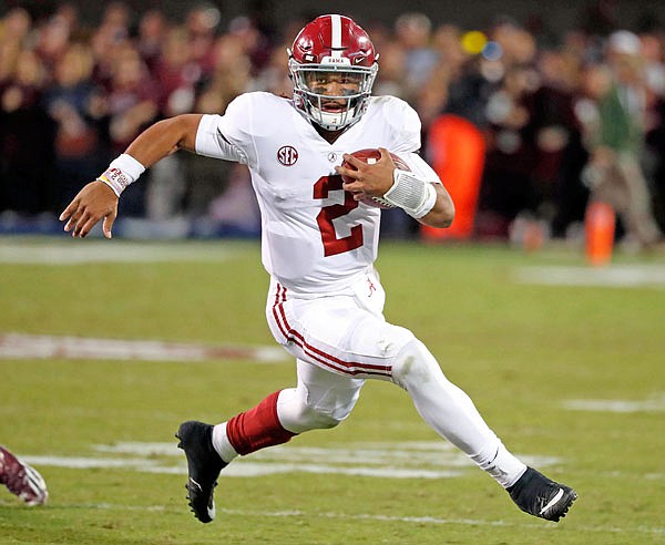 Alabama quarterback Jalen Hurts runs to the outside during Saturday's game against Mississippi State in Starkville, Miss.