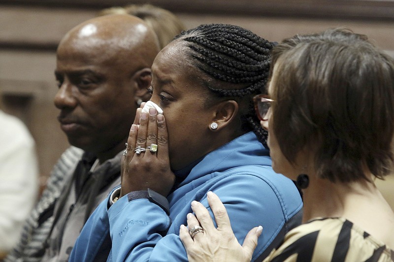 FILE - In this Friday Nov. 3, 2017 file photo, Katrina Johnson becomes emotional at the South Lee County Courthouse in Keokuk, Iowa after the jury returned a guilty verdict for Jorge Sanders-Galvez in the death of Johnson's transgender child, 16-year-old Kedarie Johnson. At least 25 transgender Americans have been homicide victims as of mid-November 2017, the highest annual total this decade, according to advocacy groups that have been monitoring the grim phenomenon and seeking ways to reduce the toll. (John Lovretta/The Hawk Eye via AP, Pool)