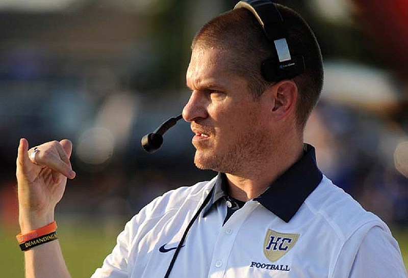 Helias head football coach Tim Rulo signals from the sideline during the 2015 jamboree in Wardsville.