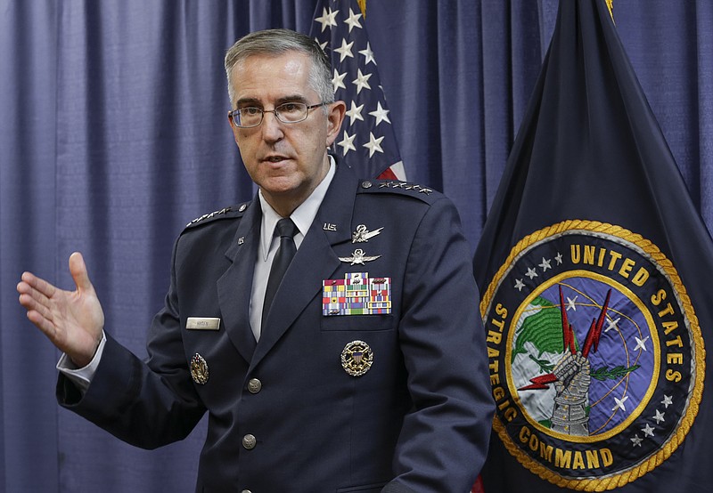 FILE - In this Thursday, Nov. 3, 2016 file photo, Air Force Gen. John Hyten, the incoming commander of the United States Strategic Command, speaks to reporters following a change of command ceremony at Offutt Air Force Base in Bellevue, Neb. On Saturday, Nov. 17, 2017, the top officer at U.S. Strategic Command says an order from President Donald Trump or any of his successors to launch nuclear weapons can be refused if that order is determined to be illegal. (AP Photo/Nati Harnik)