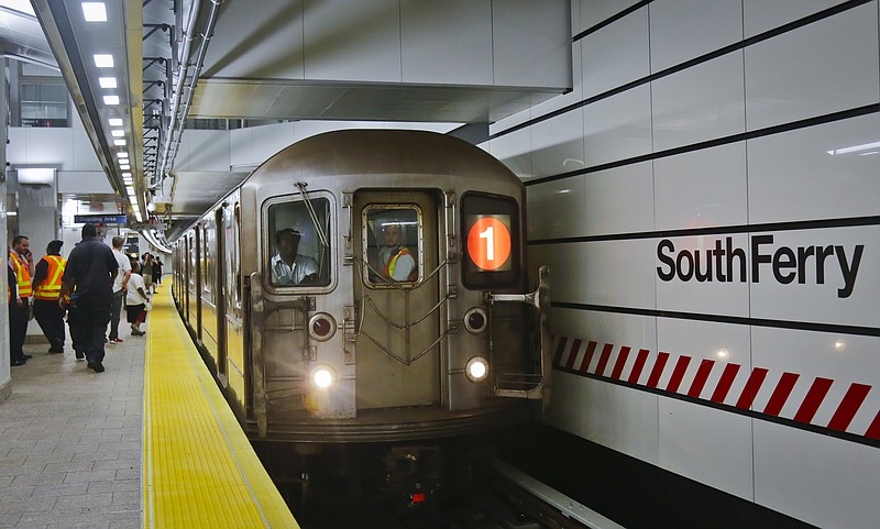 FILE - In this June 27, 2017 file photo, the No. 1 subway train pulls into the South Ferry Station in New York.  When it comes to the New York City subways, there's no such thing as ladies and gentlemen. Guidance issued by the Metropolitan Transportation Authority this Nov. 2017,  tells subway train conductors to use gender-neutral "riders" or "passengers" instead. The change is just one in the new communication rules, which also include conductors giving delayed passengers as much information as they can, and pointing out nearby tourist attractions.  (AP Photo/Bebeto Matthews)