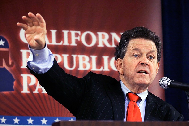 In this Friday, Oct. 4, 2013, file photo, economist Arthur Laffer, known as the "father of supply-side economics" and who was an economic advisor to President Ronald Reagan, speaks to an executive committee meeting of the California Republican Party at their convention in Anaheim, Calif. In their effort to overhaul the U.S. tax code, President Donald Trump and congressional Republicans are betting that by slashing taxes on corporations and rich people, the money diverted from the U.S. Treasury will find its way into the pockets of ordinary Americans. "It will increase real wages and it will increase them substantially,'' says Laffer. 