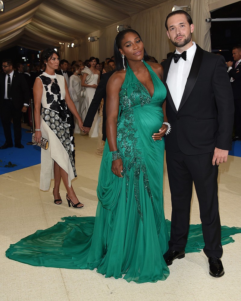 In this Monday, May 1, 2017 file photo, Serena Williams, left, and Alexis Ohanian attend The Metropolitan Museum of Art's Costume Institute benefit gala celebrating the opening of the Rei Kawakubo/Comme des Garons: Art of the In-Between exhibition in New York. The game is love for tennis star Williams and her new husband, Reddit co-founder Ohanian. The couple got married at the Contemporary Arts Center in New Orleans, according to a story and photos posted on Vogue's website on Friday night, Nov. 17, 2017. 