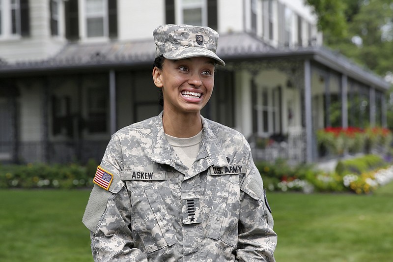 <p>AP</p><p>Cadet Simone Askew, of Fairfax, Virginia, who has been selected first captain of the U.S. Military Academy Corps of Cadets for the upcoming academic year, answers questions during a news conference in West Point, New York. Askew earned another prestigious honor Sunday, when she was one of 32 Americans awarded Rhodes scholarships to study at Oxford University in England.</p>