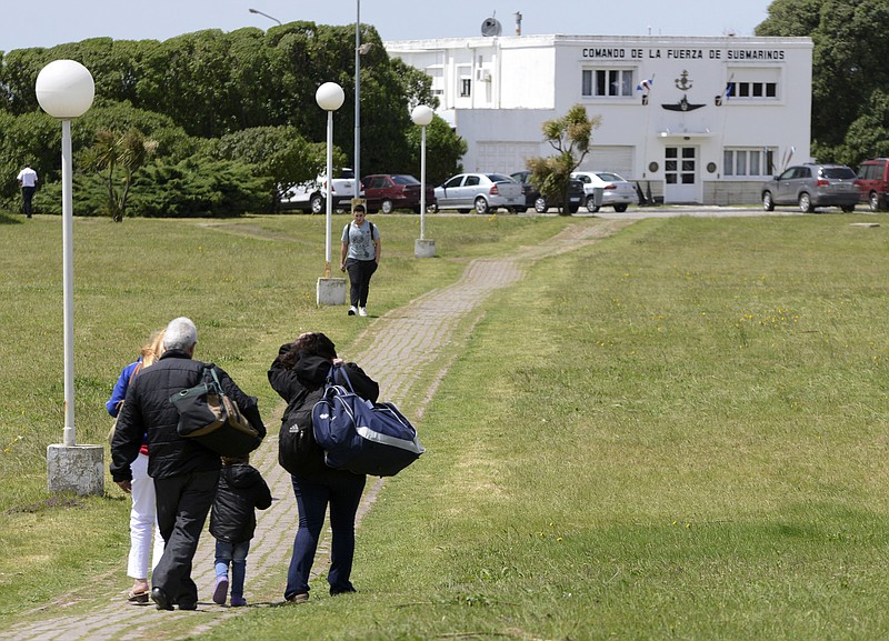 Relatives of the crew members of the submarine that's missing arrive to the Navel base in Mar del Plata, Argentina, Sunday, Nov. 19, 2017. The Navy said Saturday the area being searched off the country's southern Atlantic coast has been doubled as concerns about the fate of the missing submarine ARA San Juan and its crew grew. (AP Photo/Marina Devo)