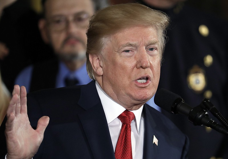 FILE - In this Oct. 26, 2017, file photo, President Donald Trump speaks during an event to declare the opioid crisis a national public health emergency in the East Room of the White House in Washington. Trump declared opioid abuse a national public health emergency at the White House in October. Trump announced an advertising campaign to combat what he said is the worst drug crisis in the nation's history, but he did not direct any new federal funding toward the effort. (AP Photo/Evan Vucci, File)