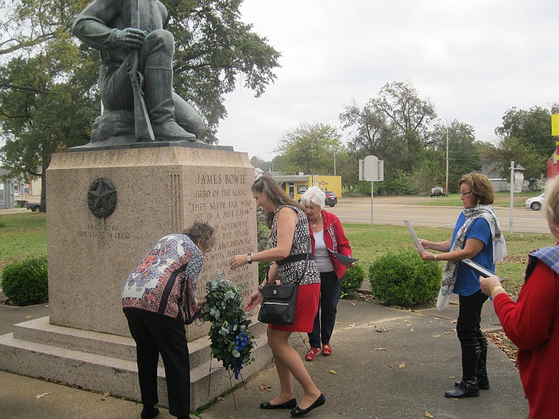 Local members of the James Bowie chapter of the Daughters of the Republic of Texas recently held their 80th anniversary commemoration of the chapter's 1937 founding by placing a memorial wreath at the James Bowie statue in the 800 block of North State Line Avenue. The chapter received its charter June 15, 1937, a year after the statue was built.
