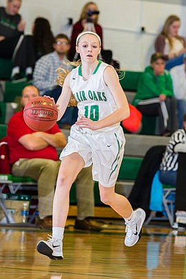 Halie Rackers of Blair Oaks brings the ball up the court during a game against Linn last season in Wardsville. Rackers is expected to be one the the Lady Falcons' top guards this season.