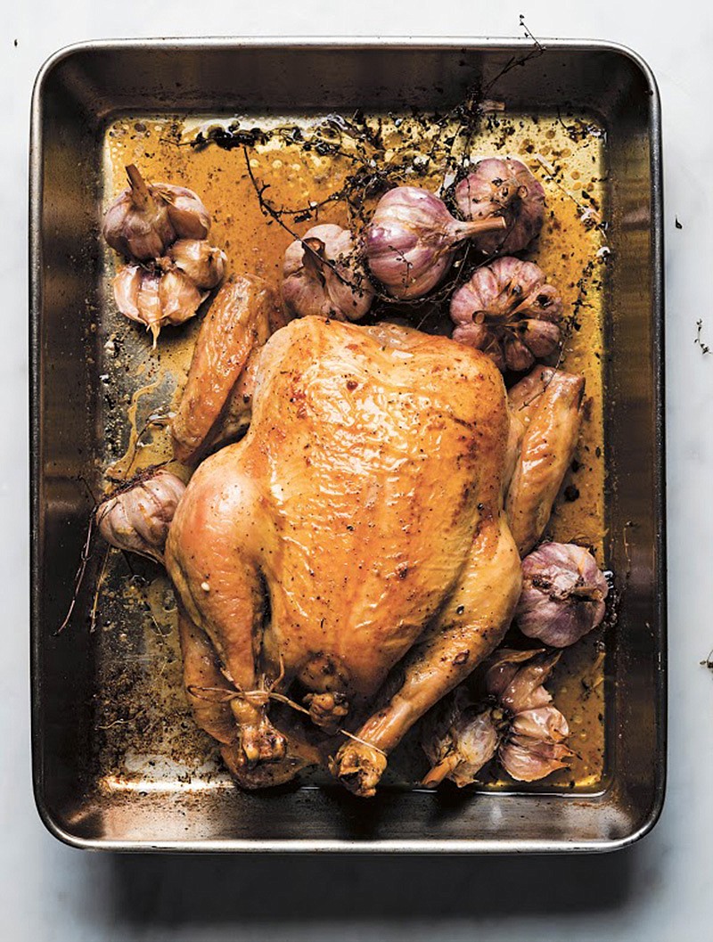 Roast Chicken with Whole Garlic Heads. 