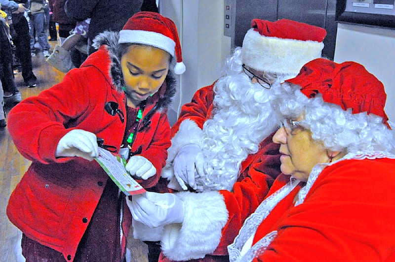 Mr. and Mrs. Claus will greet children at the Moniteau County Courthouse following the 5 p.m. parade Dec. 2. (California Democrat file photo)