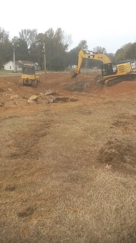 Crews from Double J Construction of De Queen, Ark., recently built a fishing pond in Mineral Springs, Ark., to provide recreation, Mayor Bobby Tullis said. This photo shows work early in the process. When water fills the pond, the Arkansas Game and Fish Commission will stock the pond with brim and bass. (Photo courtesy of the City of Mineral Springs, Ark.)
