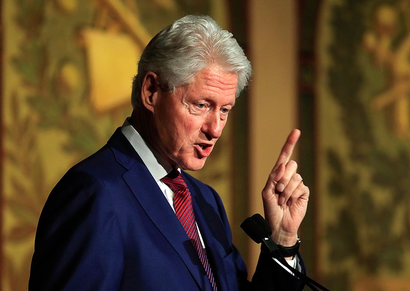 In this Nov. 6, 2017, file photo, former President Bill Clinton speaks at a symposium in Georgetown University in Washington. Democrats have been quick to support the "me too" chorus of women-and some men-who have stepped up to allege sexual misconduct and name names. But now "me too" stains the Democrats, too, putting them in an awkward place as they calibrate how forcefully to respond.