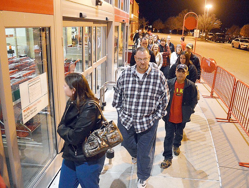 Black Friday shoppers file into Target during the early morning hours in the hopes of finding great holiday gifts. Target opened its doors at 6 a.m.