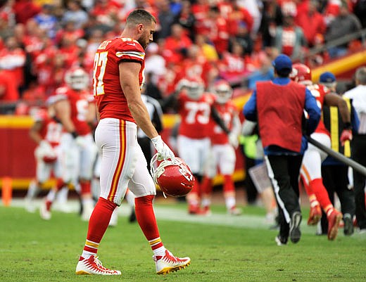 Chiefs tight end Travis Kelce walks off the field after Sunday afternoon's 16-10 loss to the Bills at Arrowhead Stadium.