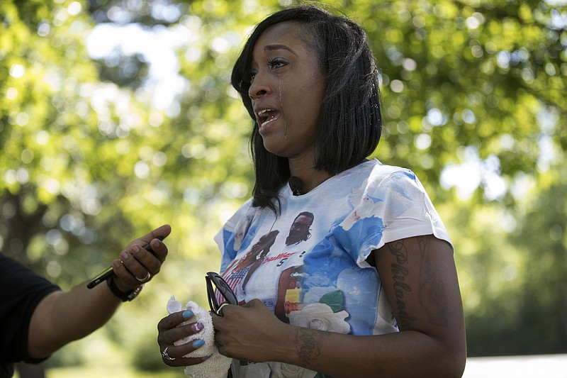 In this July 6, 2017 file photo, Diamond Reynolds, the girlfriend of Philando Castile, talks in St. Paul, Minn., about what her life has been like since Castile was fatally shot during a traffic stop a year ago. St. Anthony, the Minnesota city that employed the police officer who shot Castile, has reached a financial settlement with Reynolds and her daughter, who were in the car with him when he was killed. The St. Anthony City Council voted Tuesday Nov. 28, 2017 to pay Reynolds and her daughter $675,000. 
