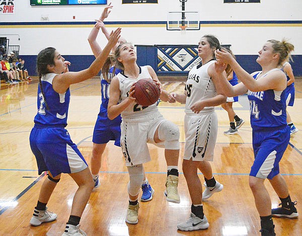 Ellie Rockers of Helias drives the lane during Thursday night's game against Boonville at Rackers Fieldhouse.