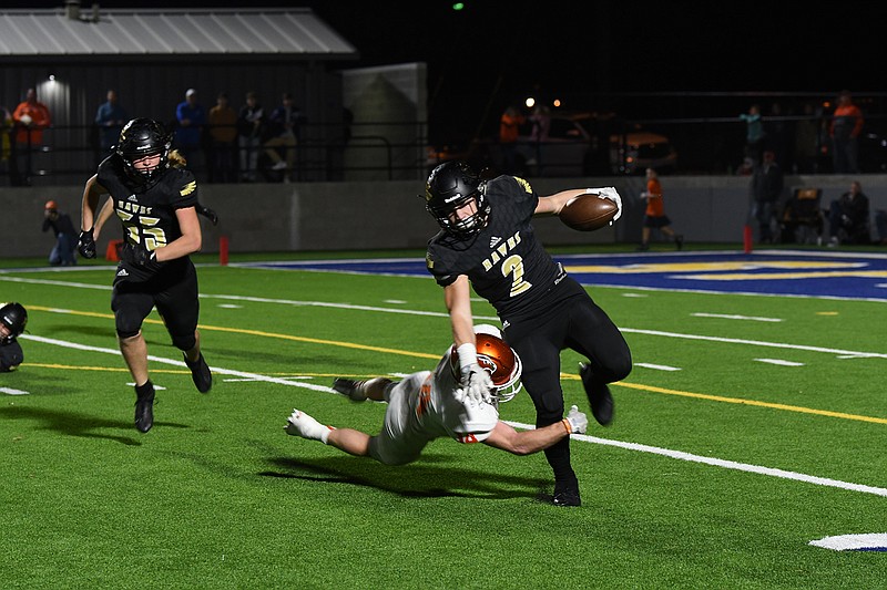 Pleasant Grove's Bruce Garrett looks to break a tackle against Celina on Friday night during a Region II-4A, Division II semifinal at Gerald Prim Stadium in Sulphur Springs, Texas. (Photo by Kevin Sutton)
