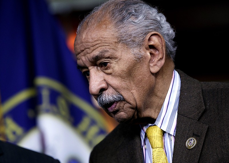 FILE -- In this file photo from Tuesday, Feb. 14, 2017, Rep. John Conyers, D-Mich., attends a news conference on Capitol Hill in Washington.  House Minority Leader Nancy Pelosi, D-Calif., the top Democrat in the House, said today, Thursday, Nov. 30, 2017, that Conyers should resign, saying the accusations are "very credible."  (AP Photo/J. Scott Applewhite, file)