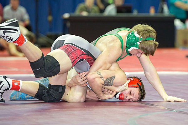 Dalton Bridges of Blair Oaks works to get Tyler Hachman of Lawson turned during the first round of the Class 1 state tournament earlier this year at Mizzou Arena.