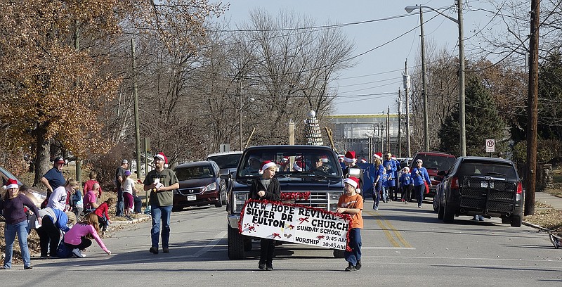 <p>Jenny Gray/FULTON SUN</p><p>Members of New Hope Revival Church particated in Fulton’s Christmas Parade on Saturday.</p>