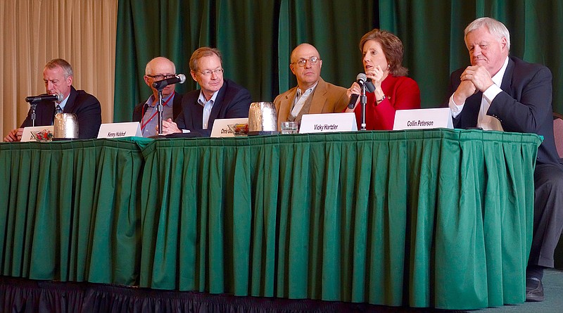 From right, Rep. Collin Peterson, D-Minnesota, and Rep. Vicky Hartzler, R-Columbia, participated in a panel with other economic and political leaders Sunday at the Missouri Farm Bureau's annual meeting at Tan-Tar-A Resort in Osage Beach.