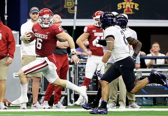 Oklahoma quarterback Baker Mayfield is one of three finalists for this season's Heisman Trophy, to be presented Saturday.