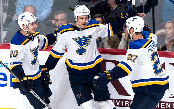 Brayden Schenn (center) of the Blues celebrates his second goal with teammates Alexander Steen (left) and Alex Pietrangelo during the second period of Tuesday night's game against the Canadiens in Montreal.
