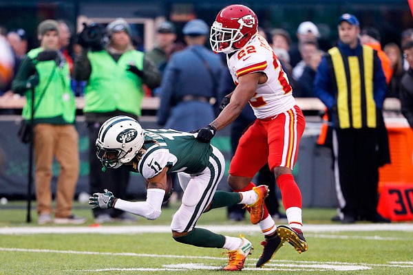 Chiefs cornerback Marcus Peters grabs Robby Anderson of the Jets during the second half of last Sunday's game in East Rutherford, N.J.