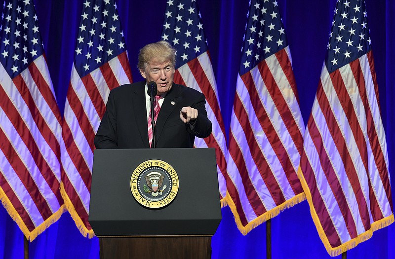 President Donald Trump speaks at the opening of the Mississippi Civil Rights Museum in Jackson, Miss., Saturday, Dec. 9, 2017. (AP Photo/Susan Walsh)