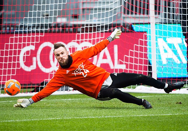 Sounders goalkeeper Stefan Frei dives for the ball during Friday's practice ahead of the MLS Cup against Toronto FC in Toronto.